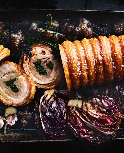 Herb and garlic porchetta with roast winter vegetables