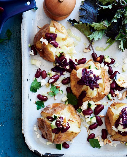 Baked potatoes with kidney beans, almonds & sauerkraut