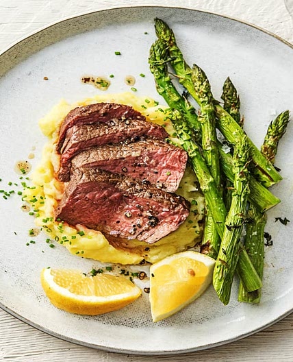Butter-Basted Rib-Eye Steak with Thyme-Infused Mashed Potatoes and Asparagus