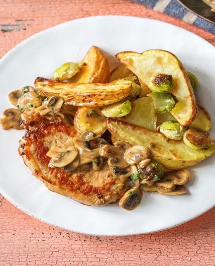 Creamy Mushroom Pork Chops with Roasted Brussels Sprouts and Crispy Potatoes
