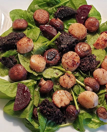 Scallops with toasted mushrooms and black pudding.