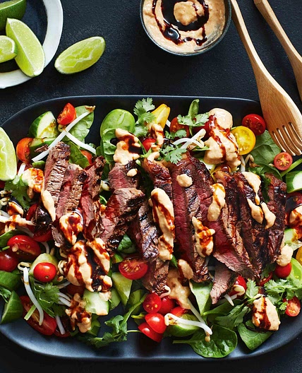Beef steak with satay sauce and sprout salad