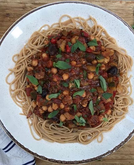Sicilian-style stew with black olives and basil