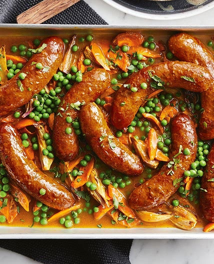 Super-easy curried sausage tray bake recipe