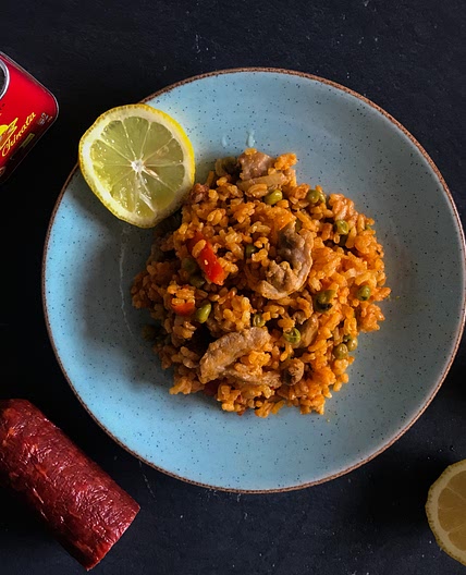 Delicious paella with chicken and chorizo