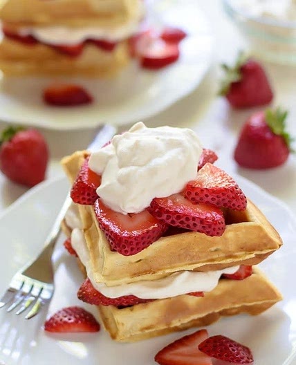 Waffles w/ wiped cream and strawberries