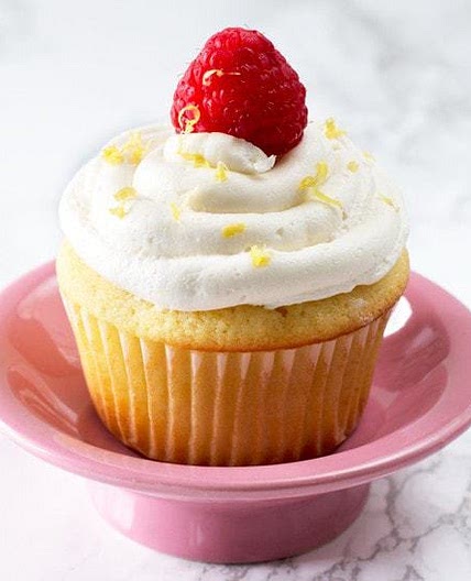 Lemon Raspberry-Filled Cupcakes with White Chocolate Buttercream Frosting