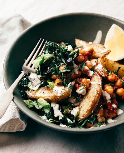 Harissa Chickpea Bowl with Potatoes, Lemony Tahini & Greens