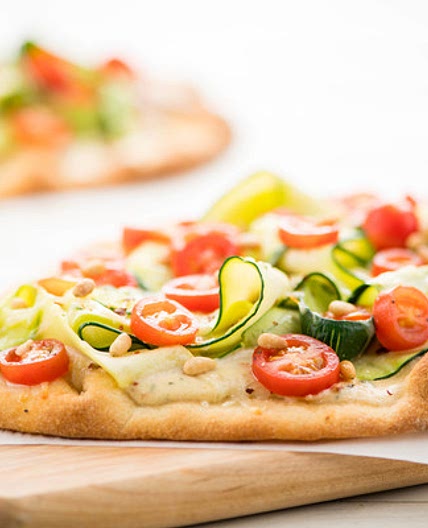 Pizza Bianca with zucchini ribbons and rosemary