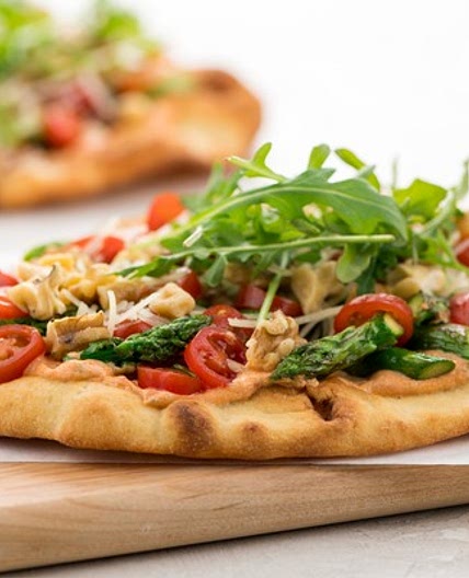 Asparagus & Tomato Flatbread with Roasted Red Pepper Crema with Asiago cheese and arugula