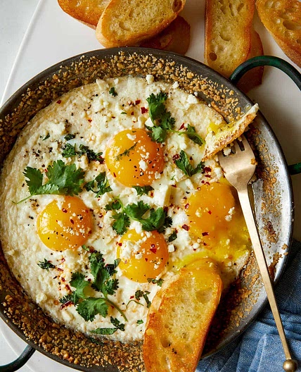 Simple Herb Baked Eggs with Crumbled Cheese