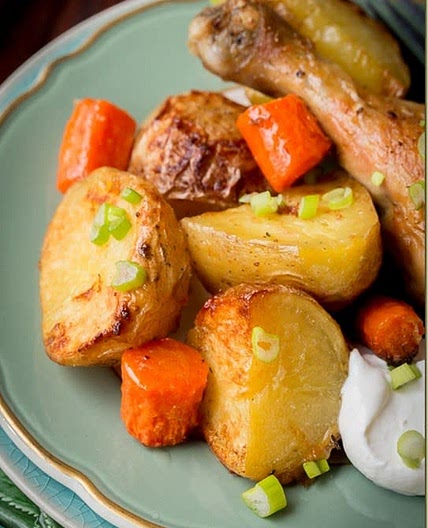 Roasted chicken with potatoes and carrots