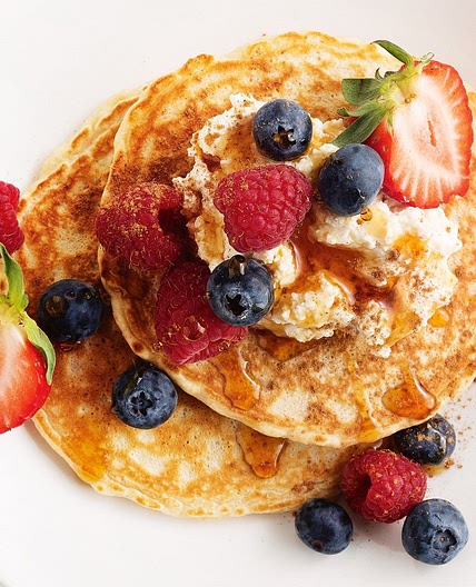 Oat pancakes with vanilla spiced ricotta & berries
