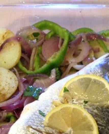 Fish with lemon and oil. (Samak Bel Lamoon we Zeit)