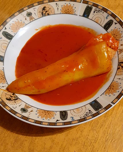 Stuffed peppers with tomato sauce