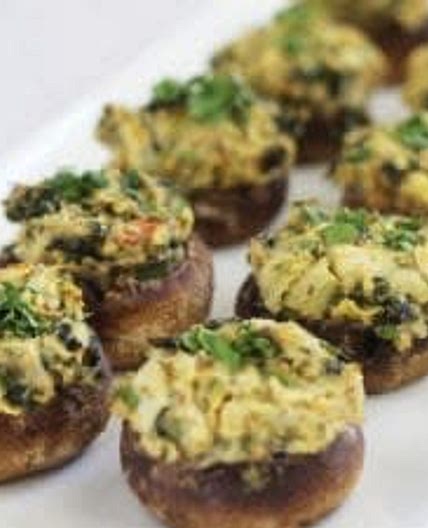Spinach and artichoke humus stuffed mushrooms 