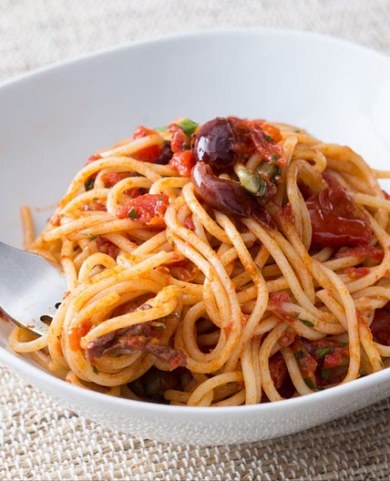 Spaghetti Puttanesca (Tomato, anchovy, olive and garlic spaghetti)