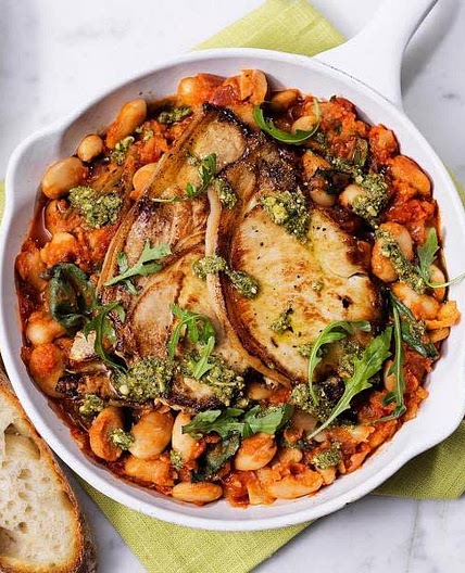 Pork steaks with tomato butter beans