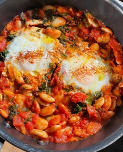 Harissa beans with poached eggs