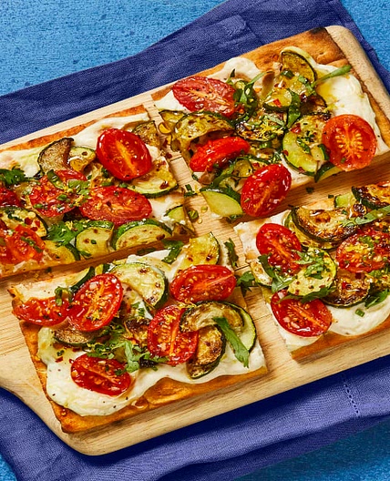 Zucchini & Tomato Flatbreads with Lemon Ricotta, Fresh Herbs, Honey & Chili Flakes
