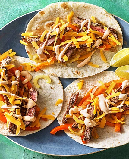 Speedy Steak Fajitas with Bell Peppers and Hot Sauce Crema