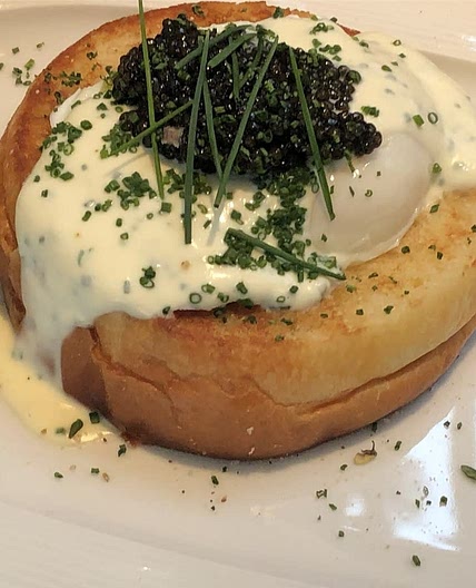 Charlie Palmer's Brioche “toad in a hole” with Black River Caviar