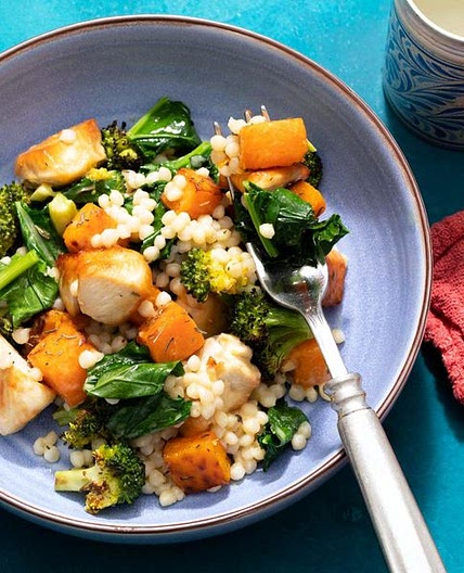 Couscous salad with chicken, butternut squash, and broccoli leaves