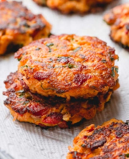 salmon cakes with red pepper sauce