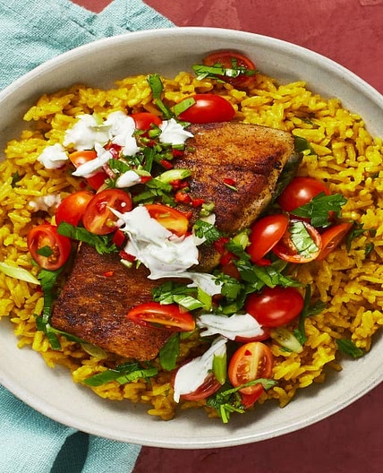 Baja Barramundi with Yellow Rice, Salsa Fresca & Zesty Crema