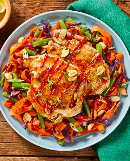 HF - Bulgogi-Glazed Pork over Veggie Stir-Fry
garnished with Candied Peanuts