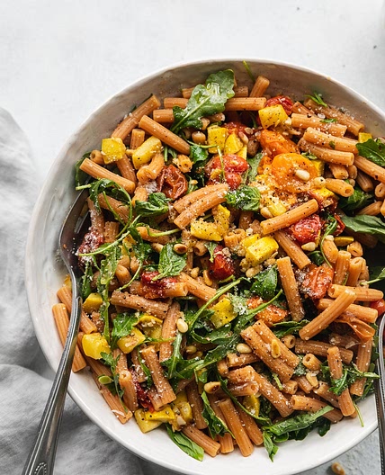 Garlic Roasted Tomato Red Lentil Pasta with Arugula and Toasted Pine Nuts