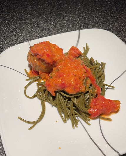 Turkey Meat Balls with vodka Sauce over Green Pasta