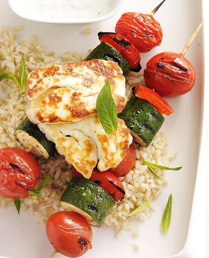 Vegetable kebabs with grilled haloumi, garlic yoghurt and lemon rice