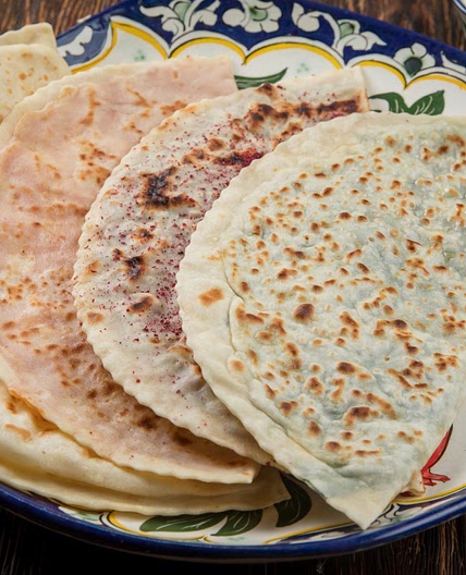 Kutab with cottage cheese and herbs