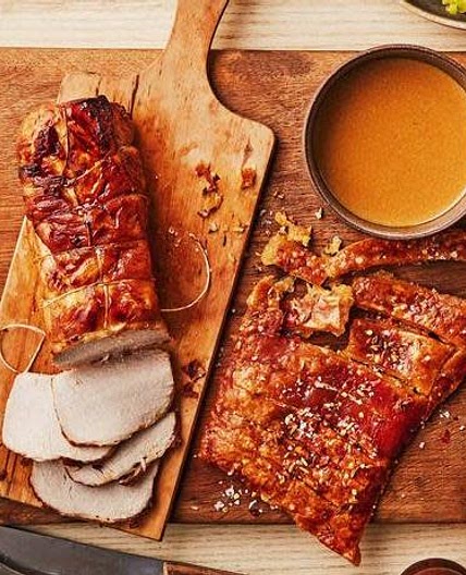 Herb-roasted pork in milk with crackling
