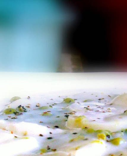 Old Fashioned Creamed New Potatoes and Peas in a White Sauce