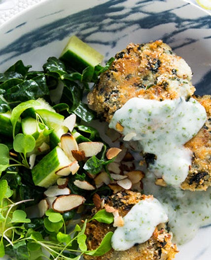 Potato and spinach cakes with almond parsley sauce