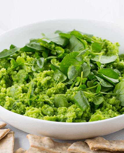 Smashed broad bean and spring onion dip with quinoa and seed crackers