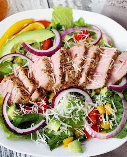 Ahi Tuna Sesame-Crusted steak with creamy dressing and Salad