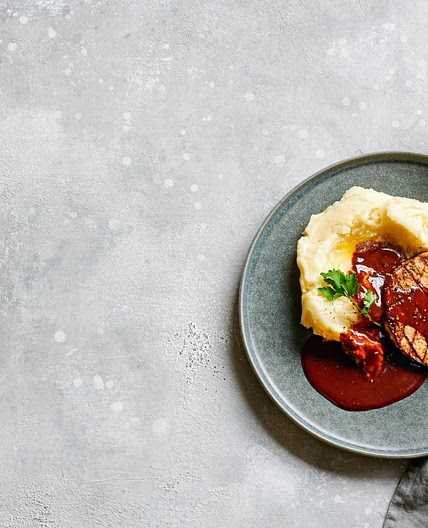 Celeriac steak with mash and gochujang sauce