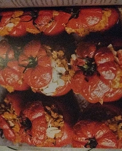 Roasted tomatoes with cinnamony millet and almonds