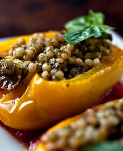 Stuffed Yellow Peppers With Israeli Couscous and Pesto