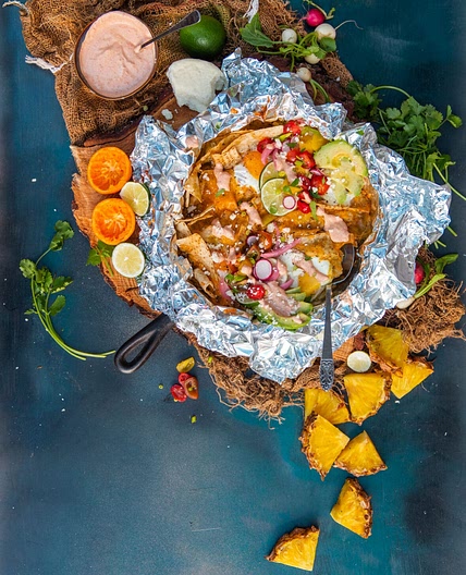 Chilaquiles Verde with Chicken and Chipotle Crema