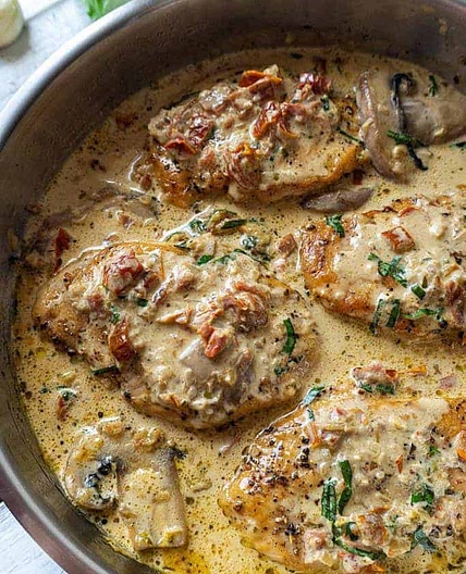 Chicken with Sun Dried Tomato and Mushroom Cream Sauce