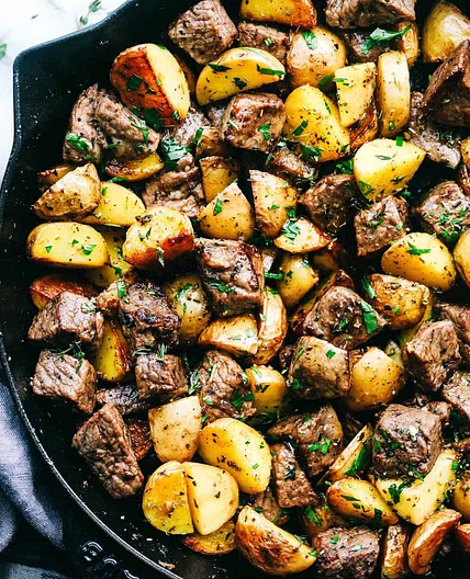 Garlic Butter Herb Steak Bites with Potatoes