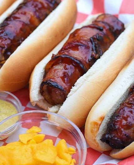 Cheese Curd Stuffed Bacon-Wrapped Brats