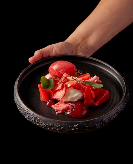 Strawberries with cultured cream, elderflower and brown butter sable by Laura Petersen