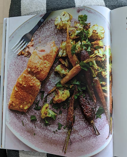 Garlic-Turmeric Salmon with Rainbow Carrots, Cauliflower, and Lemon