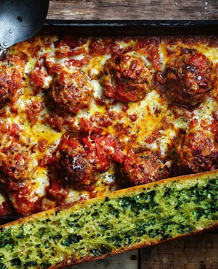 Oven-roasted chorizo meatballs with tomato ragu and herby garlic bread