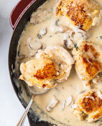 Budget-Friendly Chicken Thighs With Mushroom and White Wine Sauce